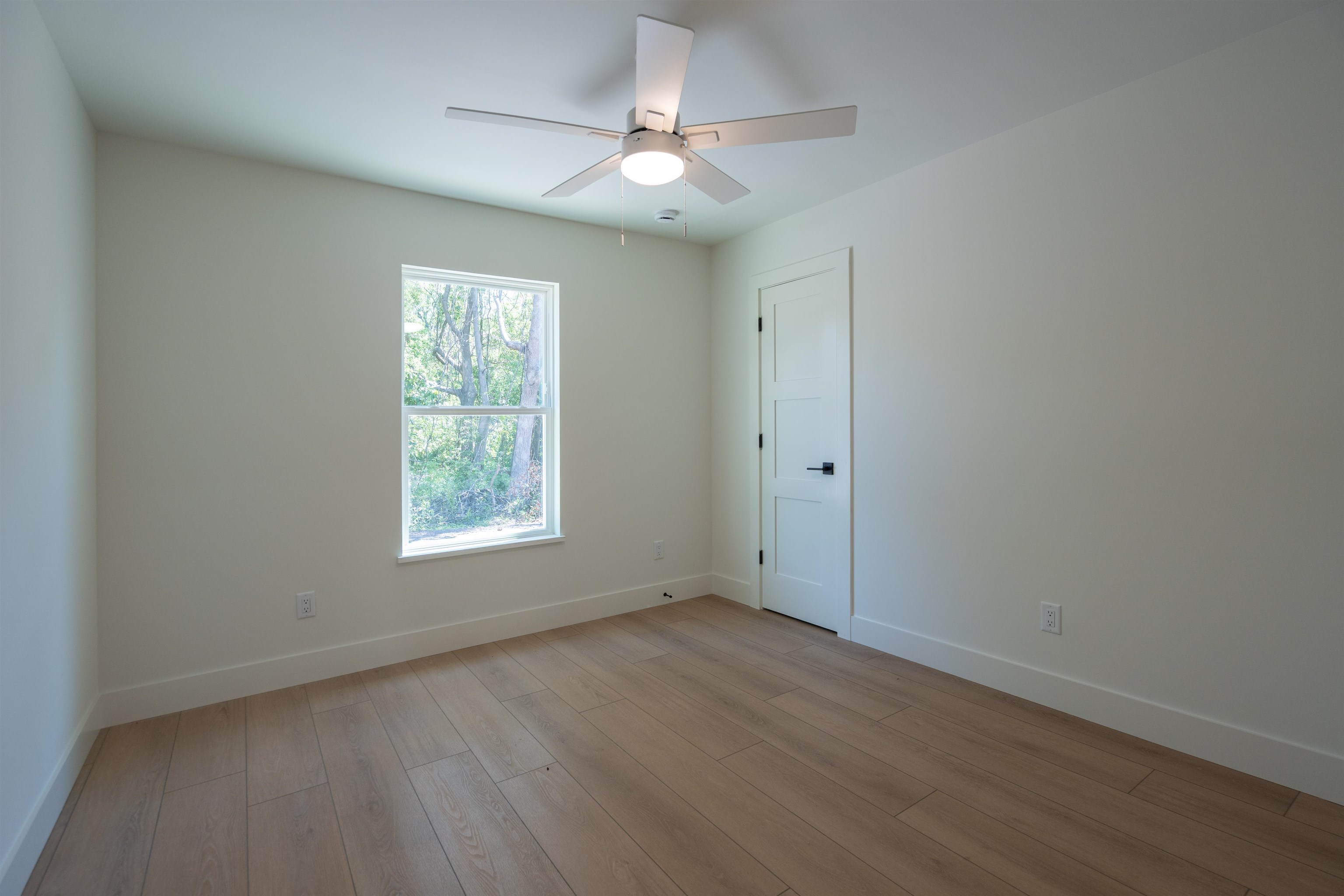 411 Royal Road St. Augustine, FL 32086 - Photo 20 of 43 wooden floor in an empty room with a window