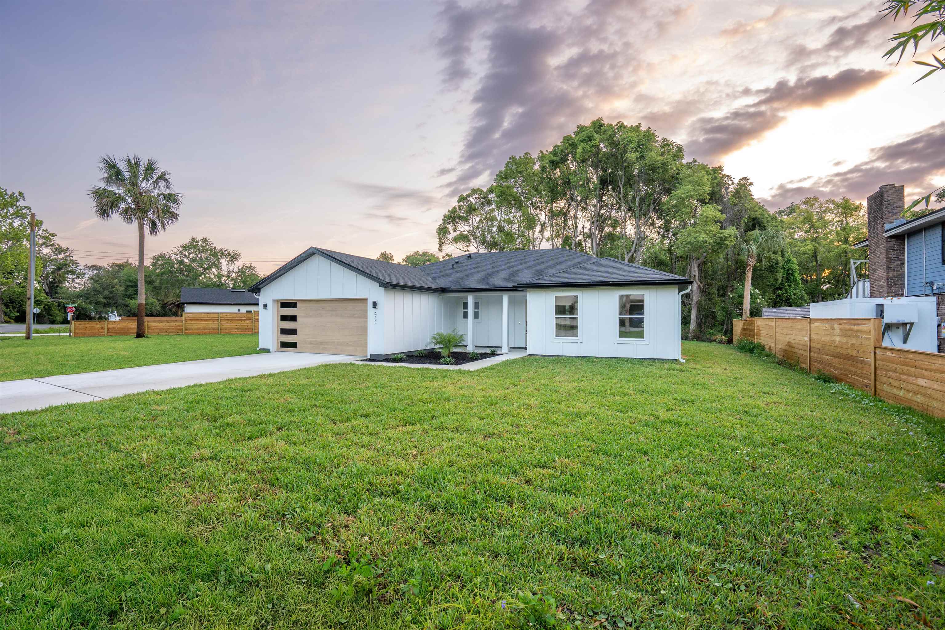 411 Royal Road St. Augustine, FL 32086 - Photo 2 of 43 a front view of house with yard and green space