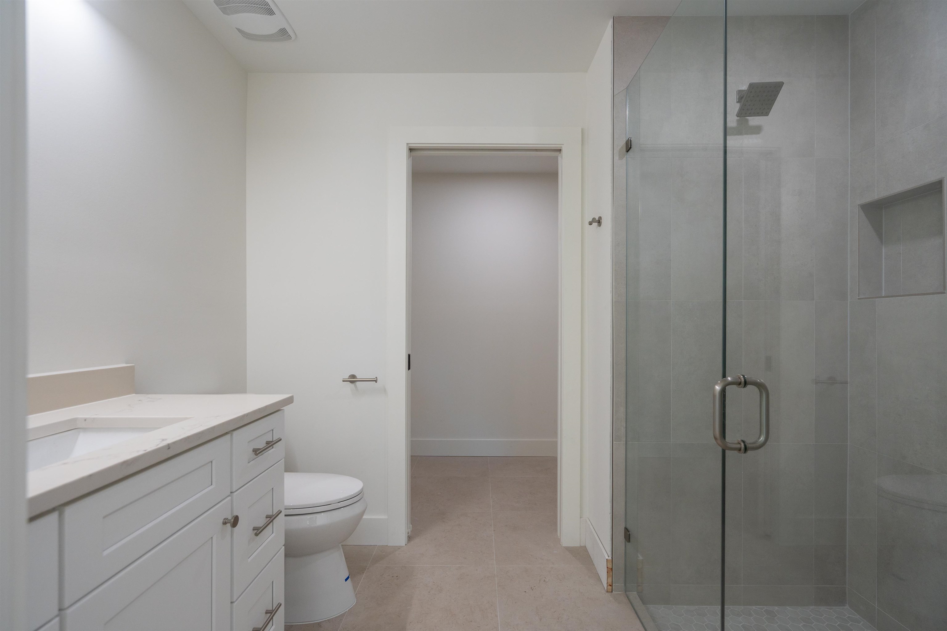 411 Royal Road St. Augustine, FL 32086 - Photo 30 of 43 a bathroom with a granite countertop toilet a sink and a mirror