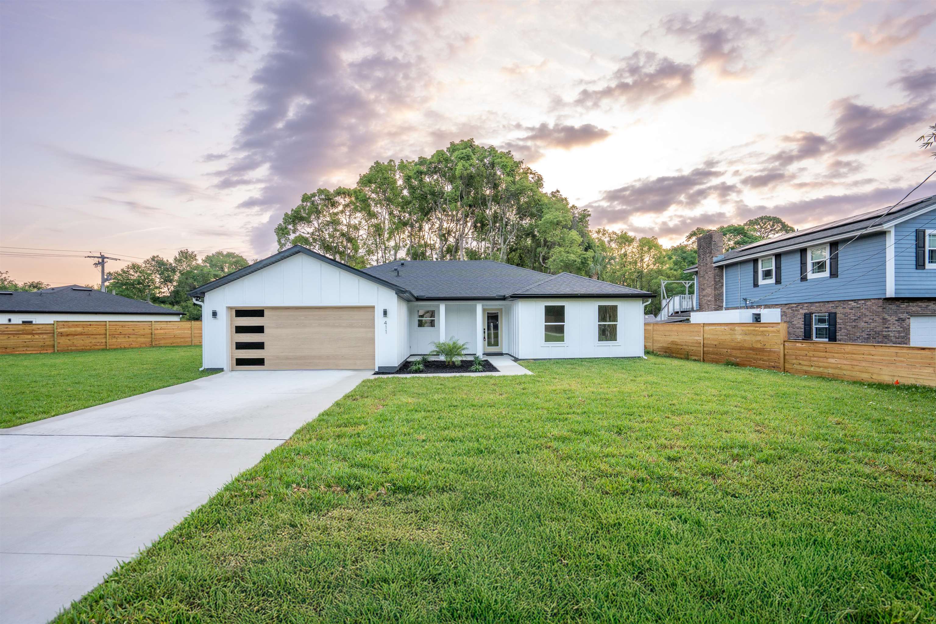 411 Royal Road St. Augustine, FL 32086 - Photo 3 of 43 a front view of house with yard and green space