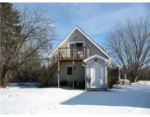 54 Hewett Road Dover-Foxcroft, ME 04426 - Photo 2 of 25 Exterior Back.