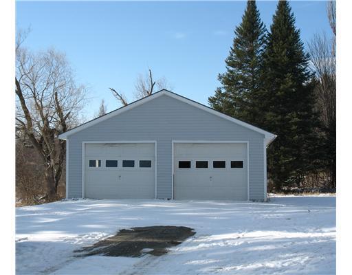 54 Hewett Road Dover-Foxcroft, ME 04426 - Photo 23 of 25 Parking Lot/Garage.