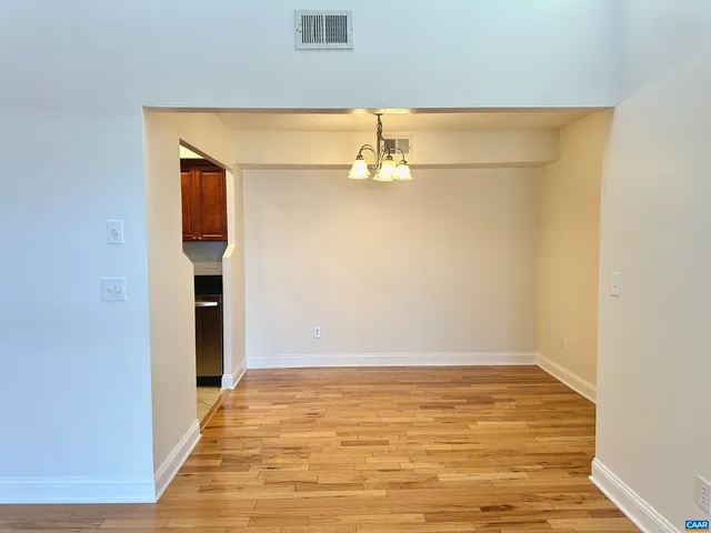 a view of an empty room with empty room