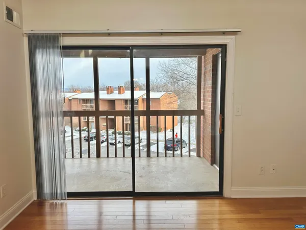 a view of staircase with large window