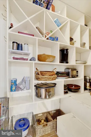 a kitchen with a stove and cabinets