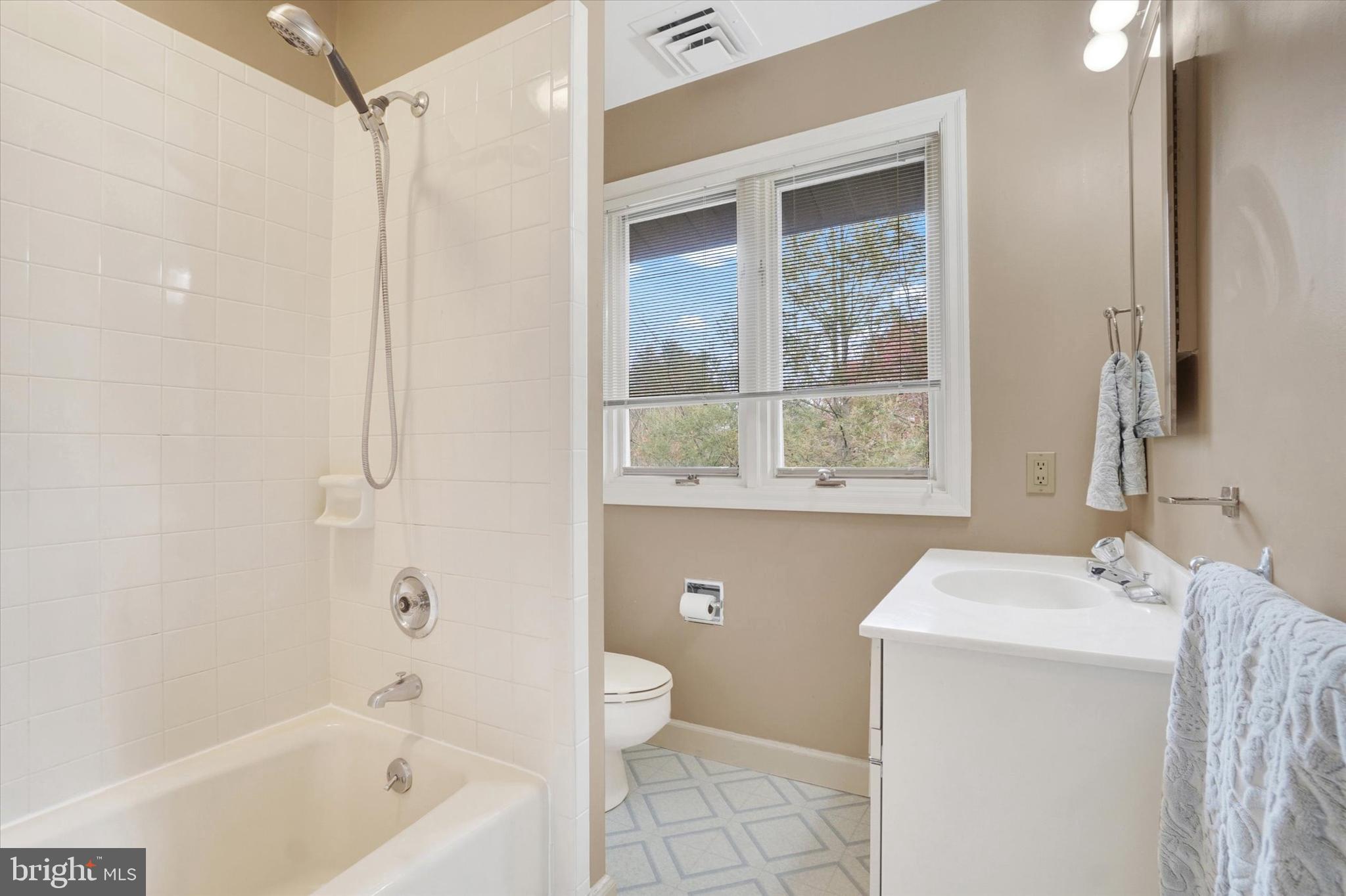 811 Michigan Avenue Lemoyne, PA 17043 - Photo 26 of 47 a bathroom with a sink a toilet and shower