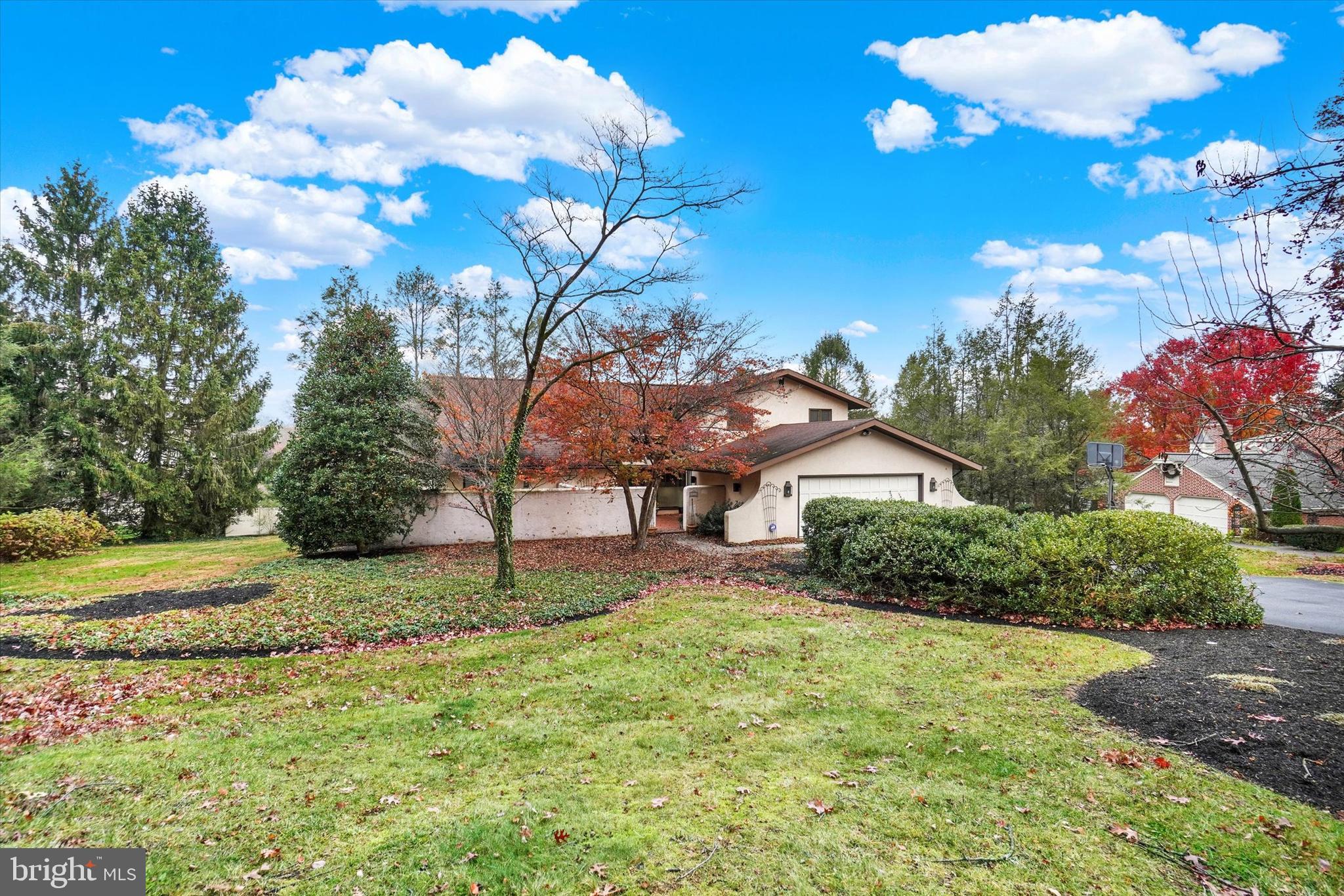 811 Michigan Avenue Lemoyne, PA 17043 - Photo 37 of 47 a backyard of a house with lots of green space and fountain