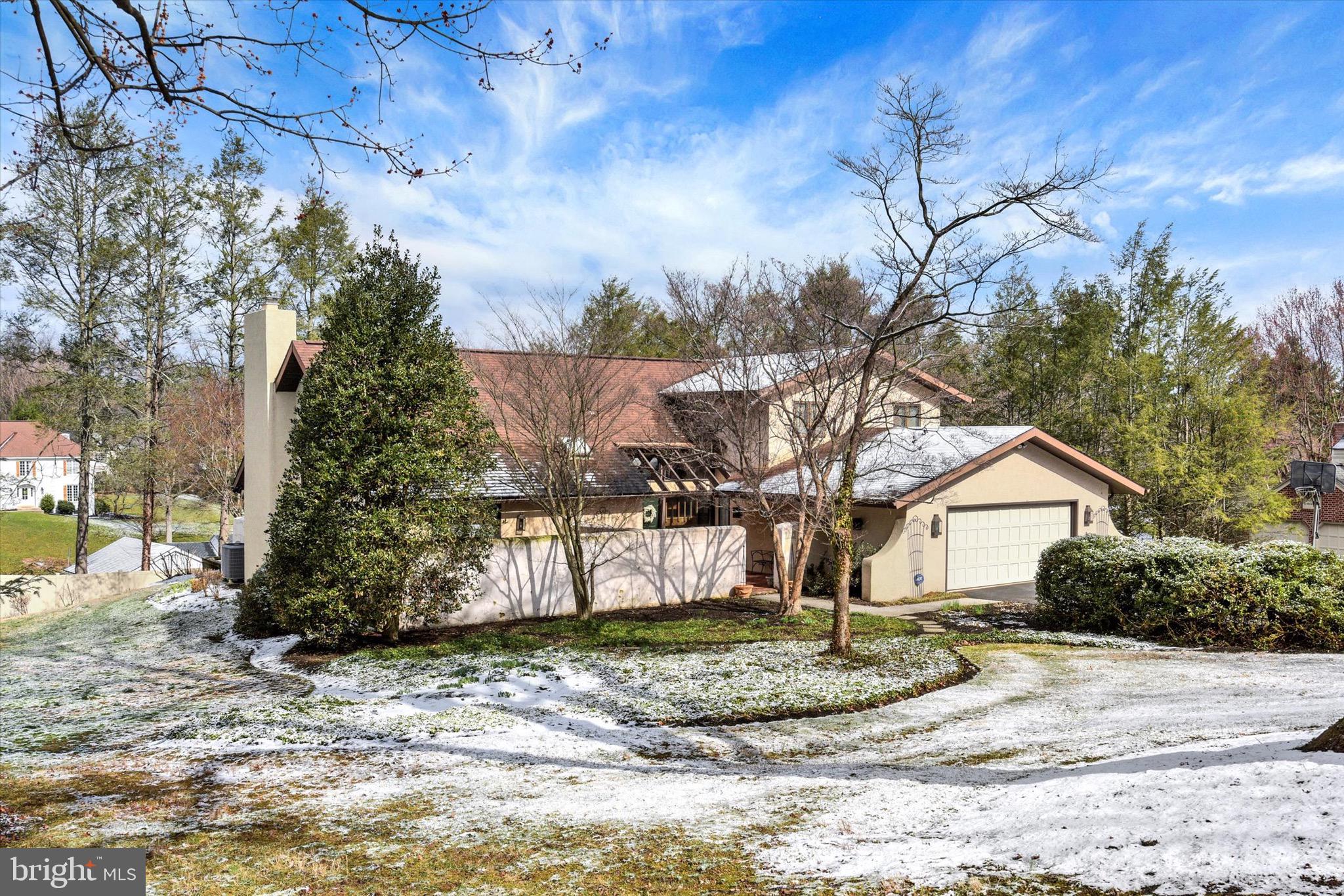811 Michigan Avenue Lemoyne, PA 17043 - Photo 46 of 50 a view of a house with a yard covered in snow