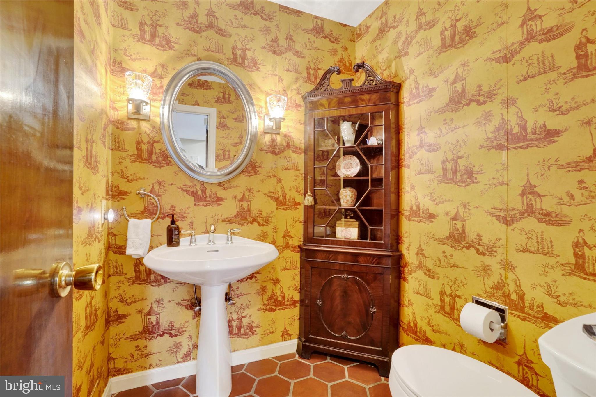 811 Michigan Avenue Lemoyne, PA 17043 - Photo 9 of 47 a bathroom with a sink and a mirror