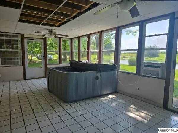 a living room with a large window