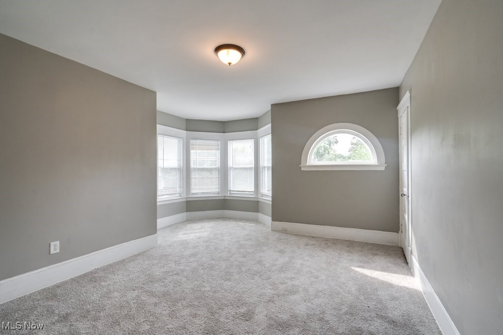 1261 Rozelle Avenue Cleveland, OH 44112 - Photo 25 of 32 View of carpeted empty room