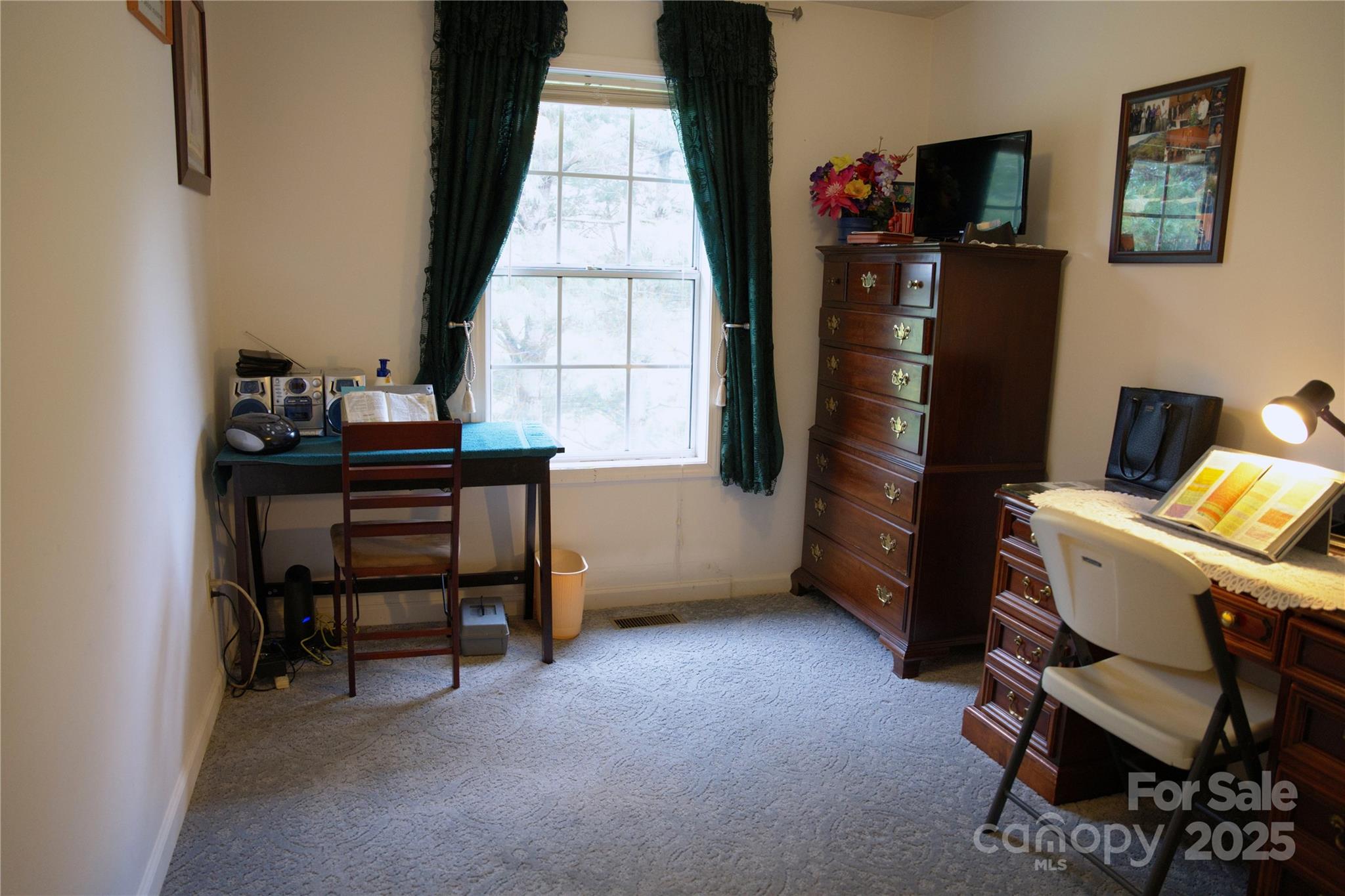 3372 Summer Road Hendersonville, NC 28792 - Photo 6 of 11 a view of a workspace with furniture and a window