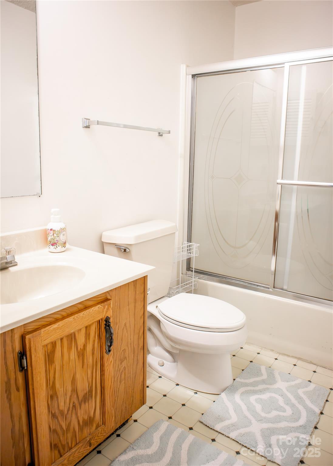 3372 Summer Road Hendersonville, NC 28792 - Photo 8 of 11 a bathroom with a sink toilet and shower