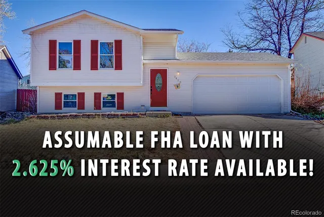 a view of a brick house with large windows