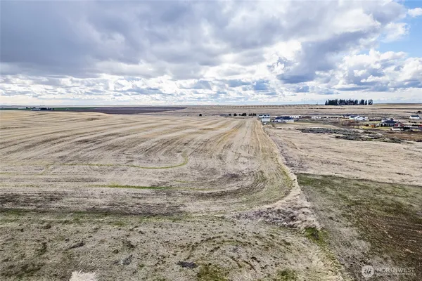 a view of an ocean beach and a building