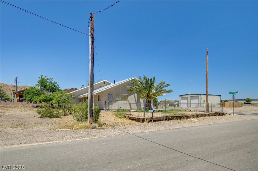 590 East Encinitas Street Searchlight, NV 89046 - Photo 22 of 39 This charming residence offers comfortable living in a serene desert landscape.