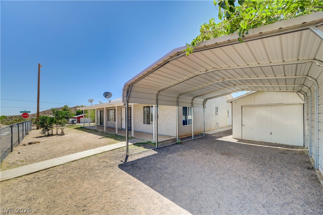 590 East Encinitas Street Searchlight, NV 89046 - Photo 24 of 39 This property features a covered carport, offering ample space and protection.
