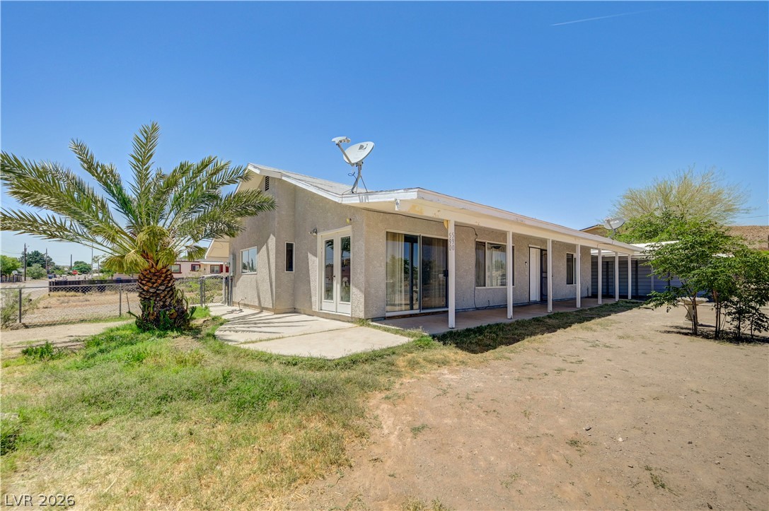 590 East Encinitas Street Searchlight, NV 89046 - Photo 26 of 39 This home features a private yard with a covered patio, perfect for outdoor enjoyment.