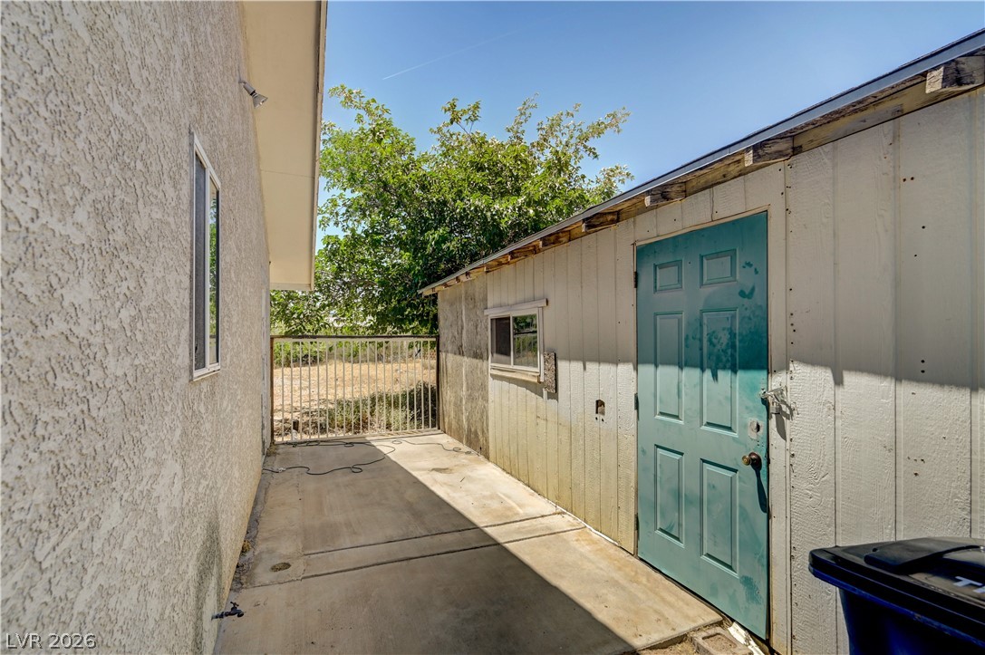 590 East Encinitas Street Searchlight, NV 89046 - Photo 28 of 39 This property offers convenient storage space with a detached shed and a private outdoor area.