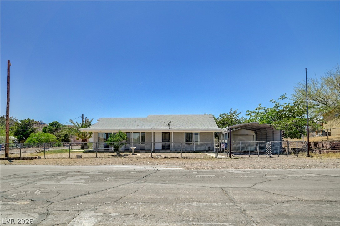 590 East Encinitas Street Searchlight, NV 89046 - Photo 10 of 39 This charming residence features a classic ranch-style design, offering comfort and practicality.