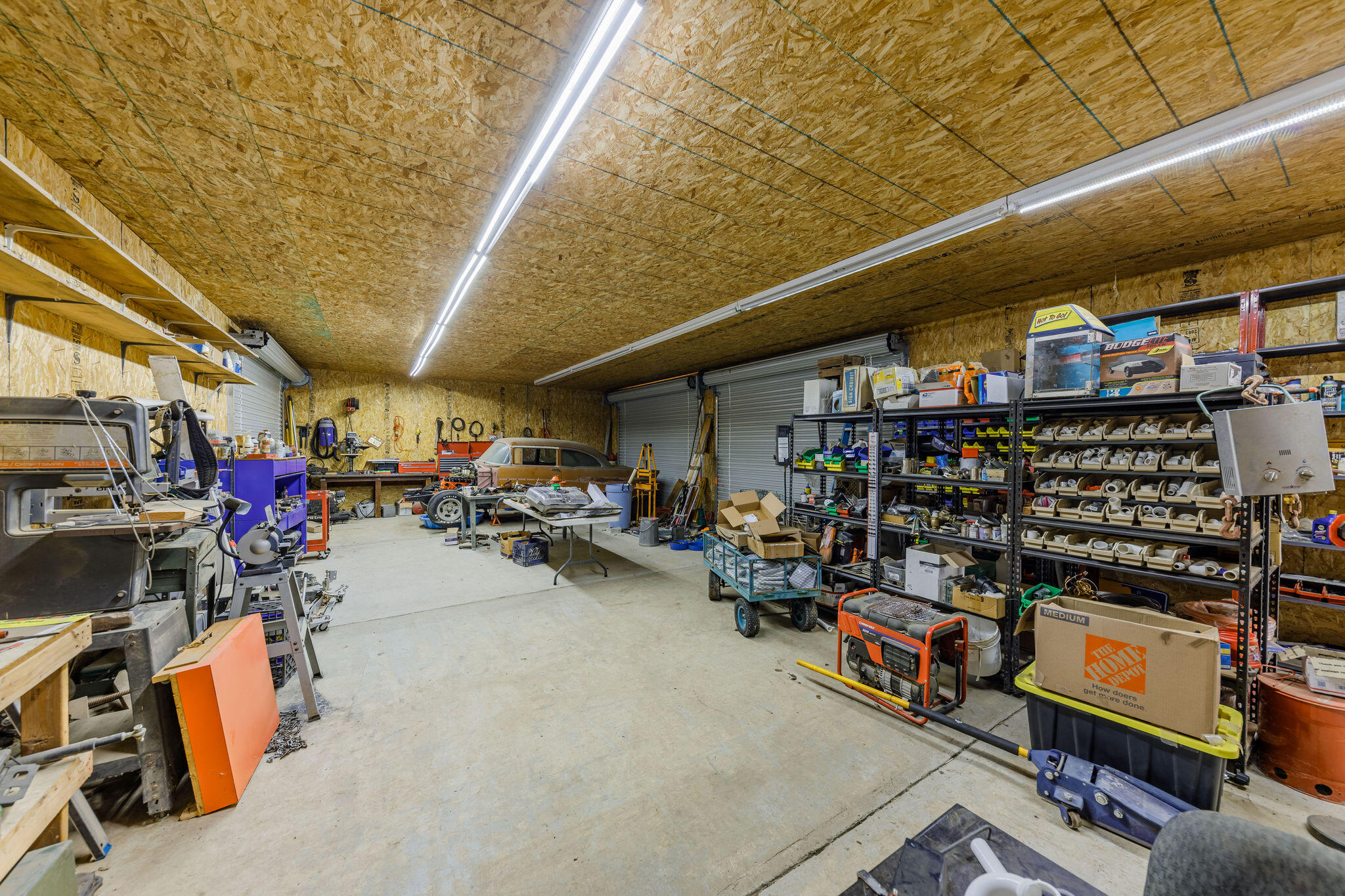 6790 Holland Loop Road Cave Junction, OR 97523 - Photo 84 of 151 a view of a storage room with lots of stuff