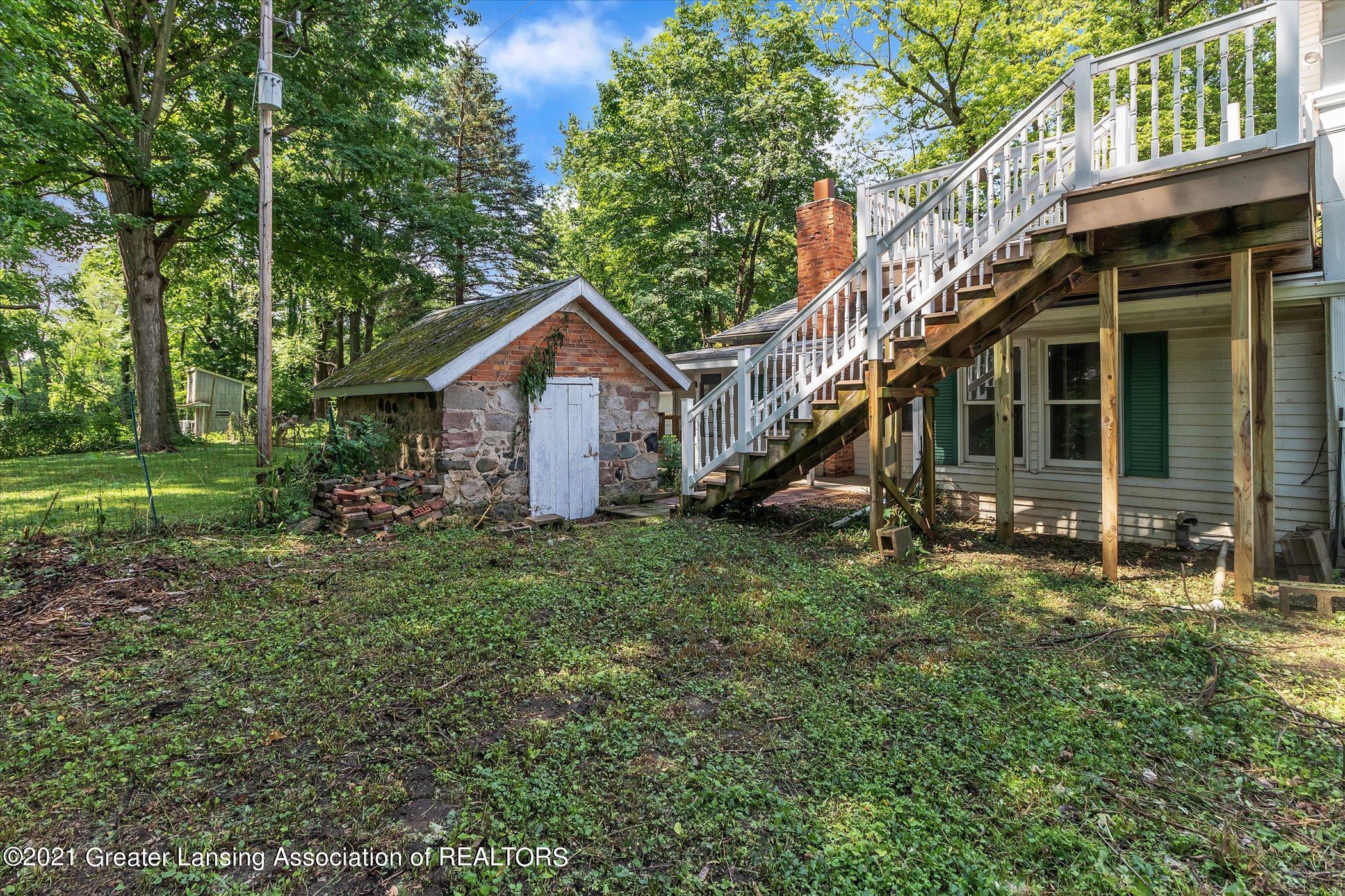 131 West Miller Road Lansing, MI 48911 - Photo 46 of 48 Stone smoke house
