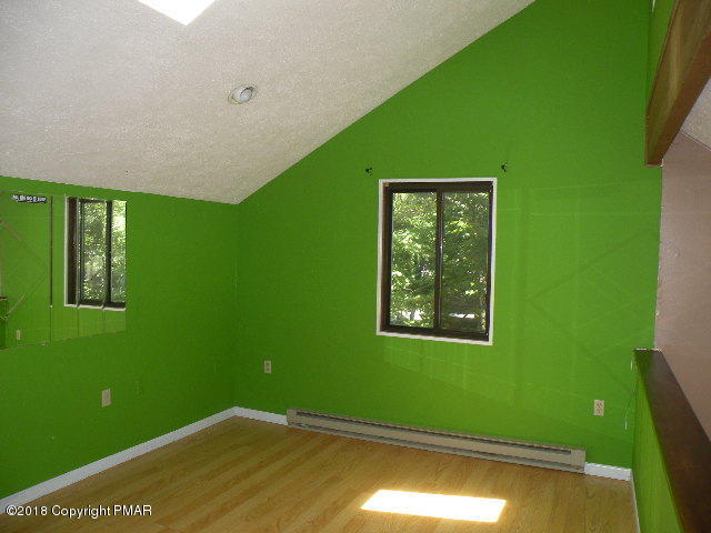 703 Edgewood Road Tobyhanna, PA 18466 - Photo 14 of 17 a view of a window in an empty room