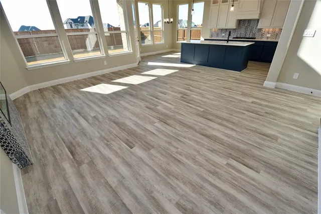 a view of a living room with a large window