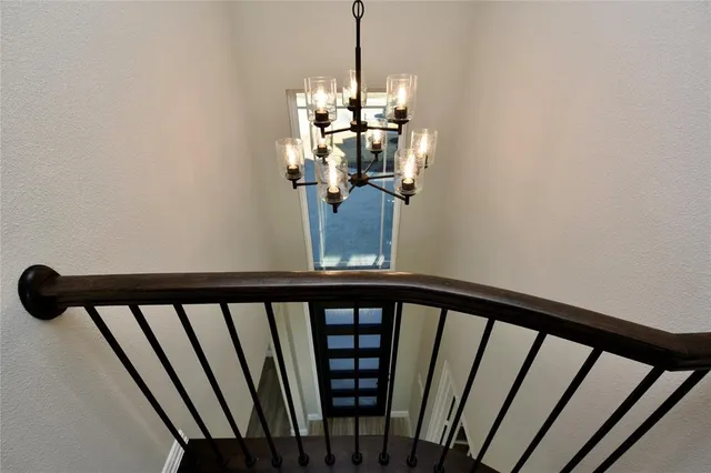 a view of a balcony with wooden floor