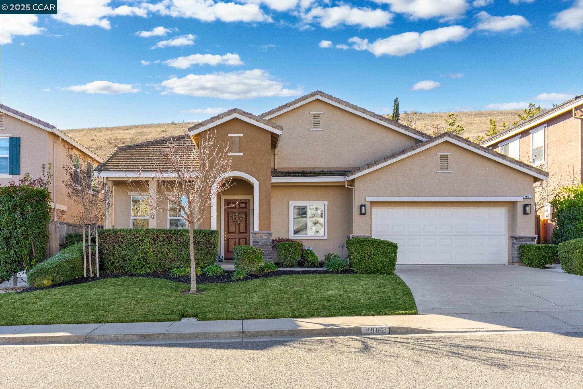 2986 Pilar Ridge Drive Bay Point, CA 94565 - Photo 1 of 1 a front view of a house with a yard