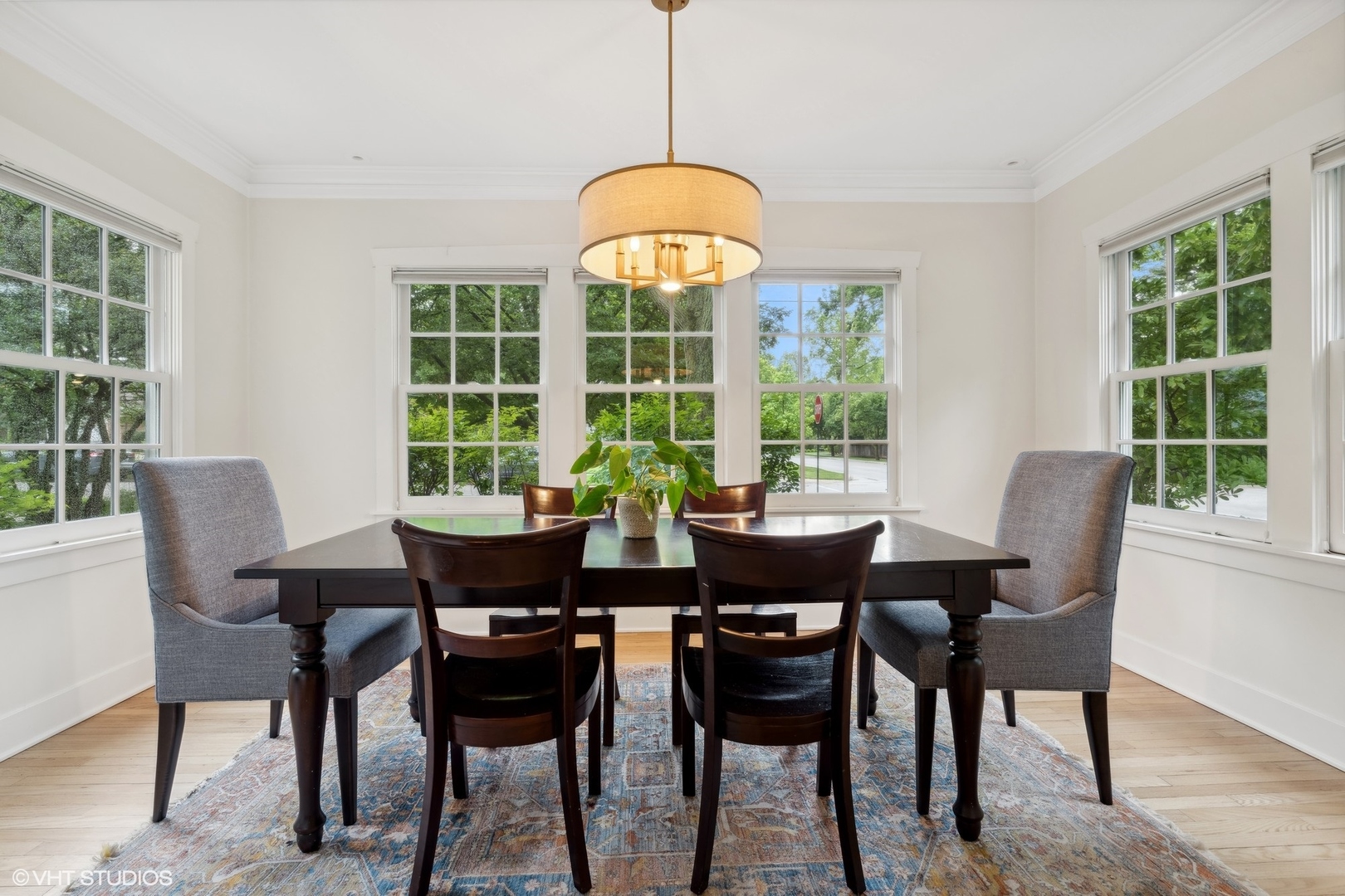 720 Willow Road Winnetka, IL 60093 - Photo 12 of 60 a view of a dining room with furniture window and outside view