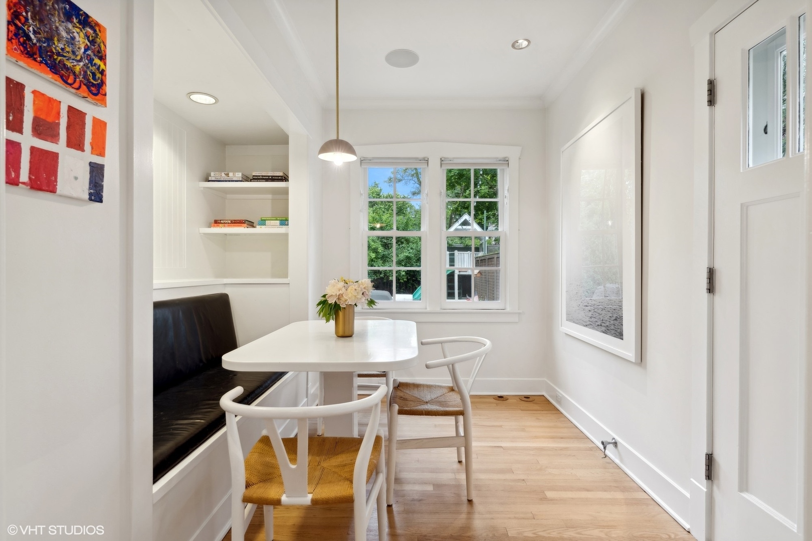 720 Willow Road Winnetka, IL 60093 - Photo 16 of 60 a view of a dining room with furniture window and wooden floor