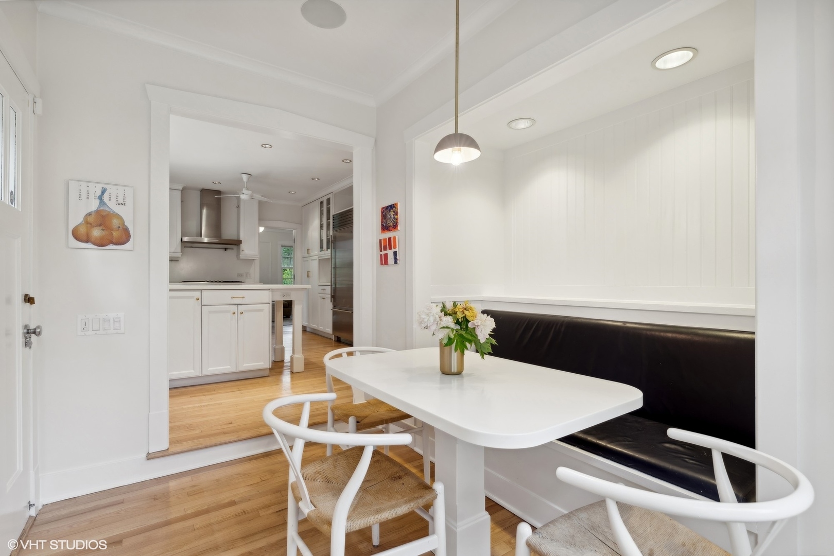 720 Willow Road Winnetka, IL 60093 - Photo 17 of 60 a view of a dining room with furniture and wooden floor