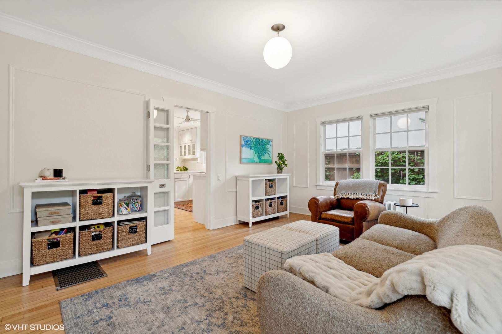 720 Willow Road Winnetka, IL 60093 - Photo 19 of 60 a living room with furniture and a flat screen tv