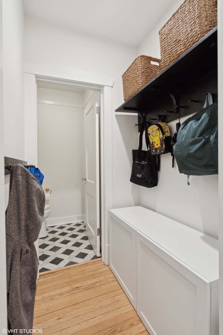 720 Willow Road Winnetka, IL 60093 - Photo 21 of 60 a bedroom with a bed and a cabinets