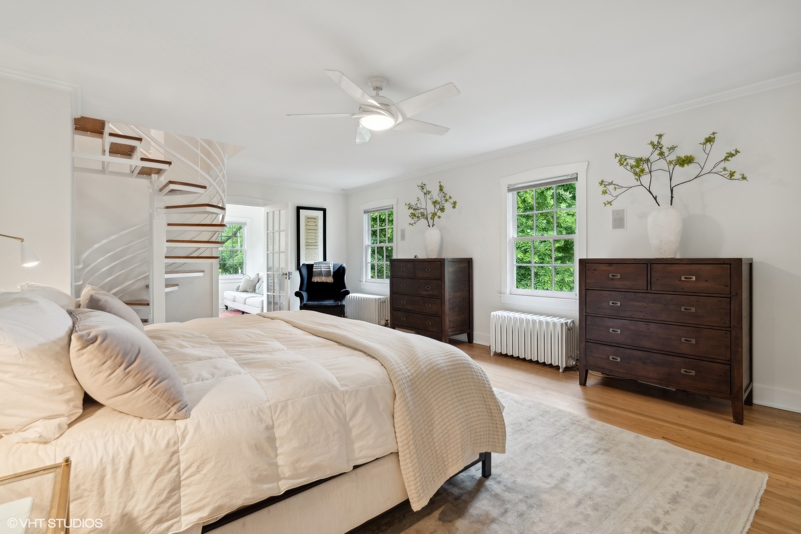 720 Willow Road Winnetka, IL 60093 - Photo 24 of 60 a spacious bedroom with a bed and a dresser