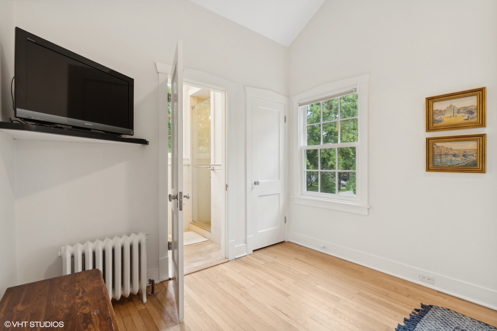 720 Willow Road Winnetka, IL 60093 - Photo 33 of 60 a view of a livingroom with a flat screen tv