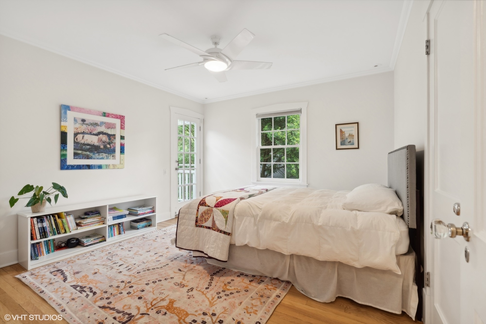 720 Willow Road Winnetka, IL 60093 - Photo 36 of 60 a bedroom with a bed and a flat screen tv