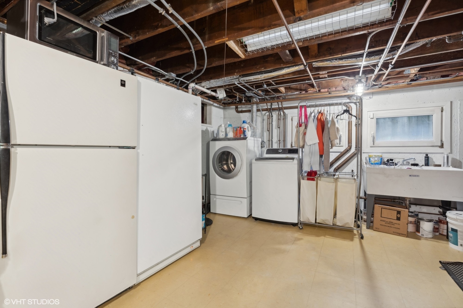 720 Willow Road Winnetka, IL 60093 - Photo 47 of 60 a utility room with dryer and washer