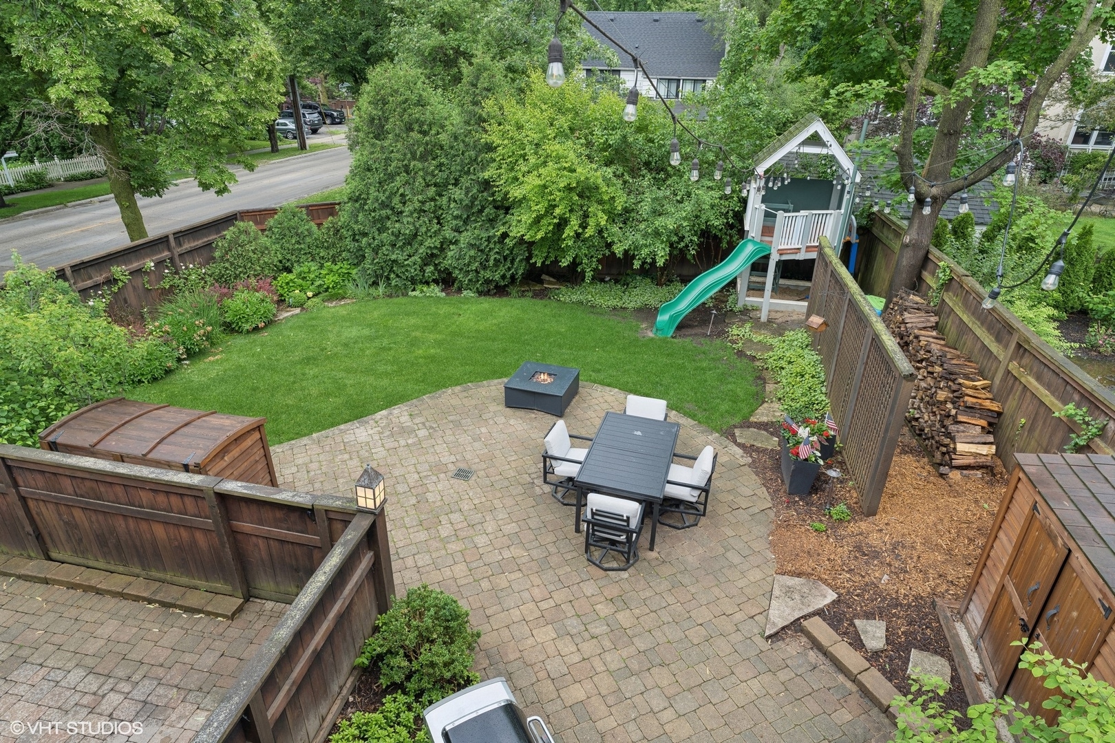 720 Willow Road Winnetka, IL 60093 - Photo 53 of 60 a view of a backyard with sitting area