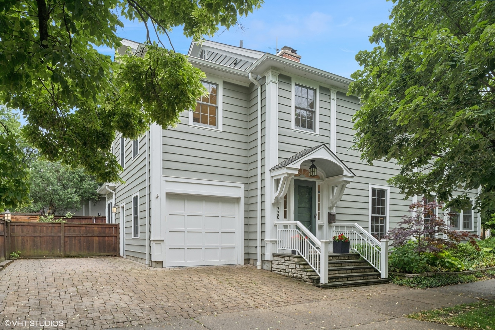720 Willow Road Winnetka, IL 60093 - Photo 59 of 60 a front view of a house with a yard