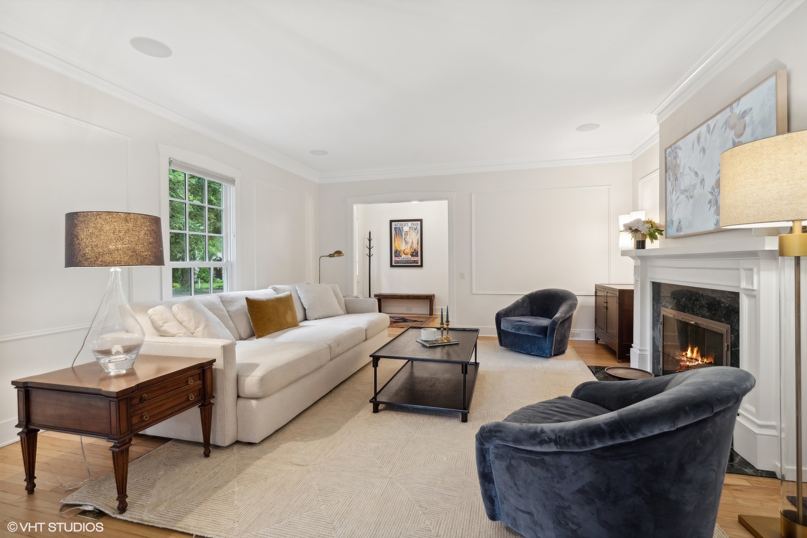 720 Willow Road Winnetka, IL 60093 - Photo 9 of 60 a living room with furniture and a fireplace