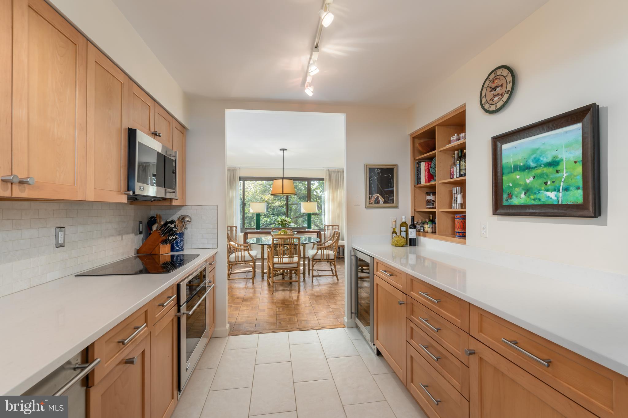 1077 30th Street Northwest, Unit 606 Washington, DC 20007 - Photo 4 of 30 Kitchen leading to Dining