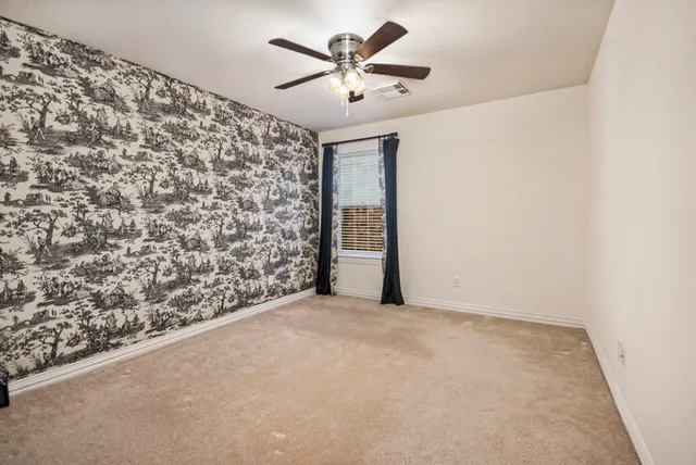 a view of a livingroom with furniture and a chandelier