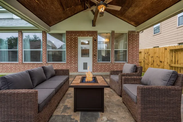 a outdoor living space with furniture and a potted plant