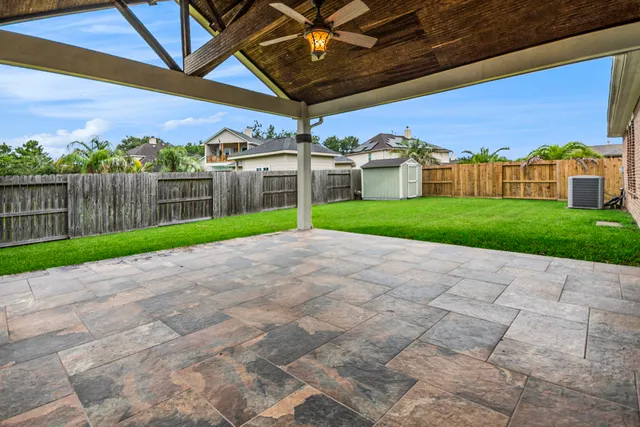 a view of a house with a back yard