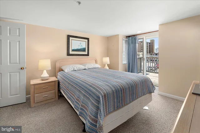 a view of staircase and living room with windows