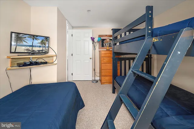 an aerial view of a city with ocean