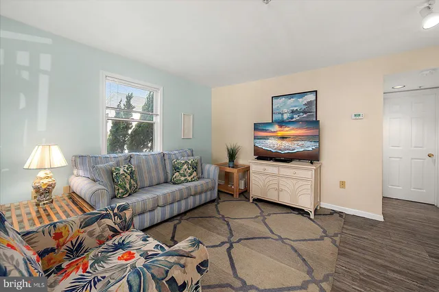 a kitchen with stainless steel appliances a refrigerator sink and cabinets