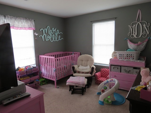 430 Pioneer Road Macon, GA 31217 - Photo 16 of 23 a bedroom with furniture and a window